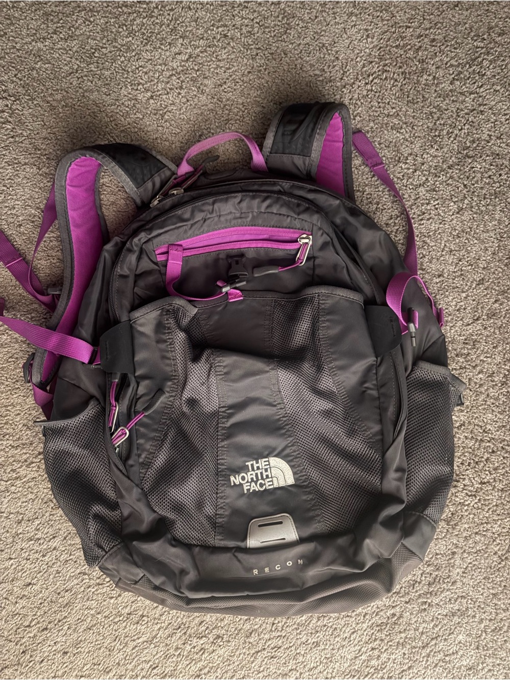 The North Face Black Backpack with Purple Accents